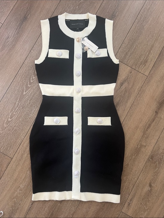 Anthropologie Dresses & Skirts - Anthropologie Black and Cream Sleeveless Button-Front Knit Mini Dress